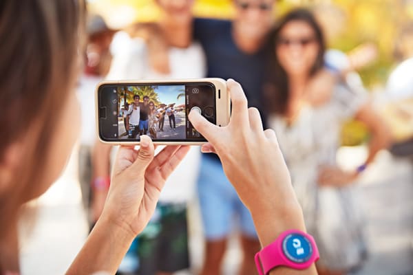A guest using her medallion